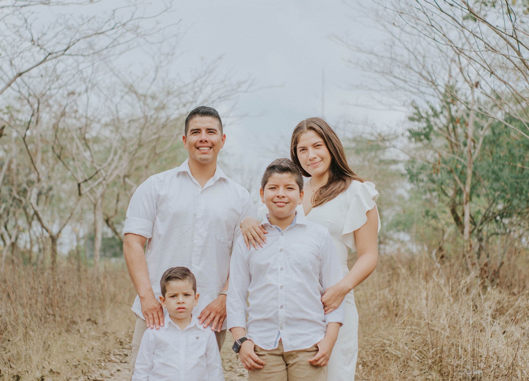 A joyful family portrait in the countryside